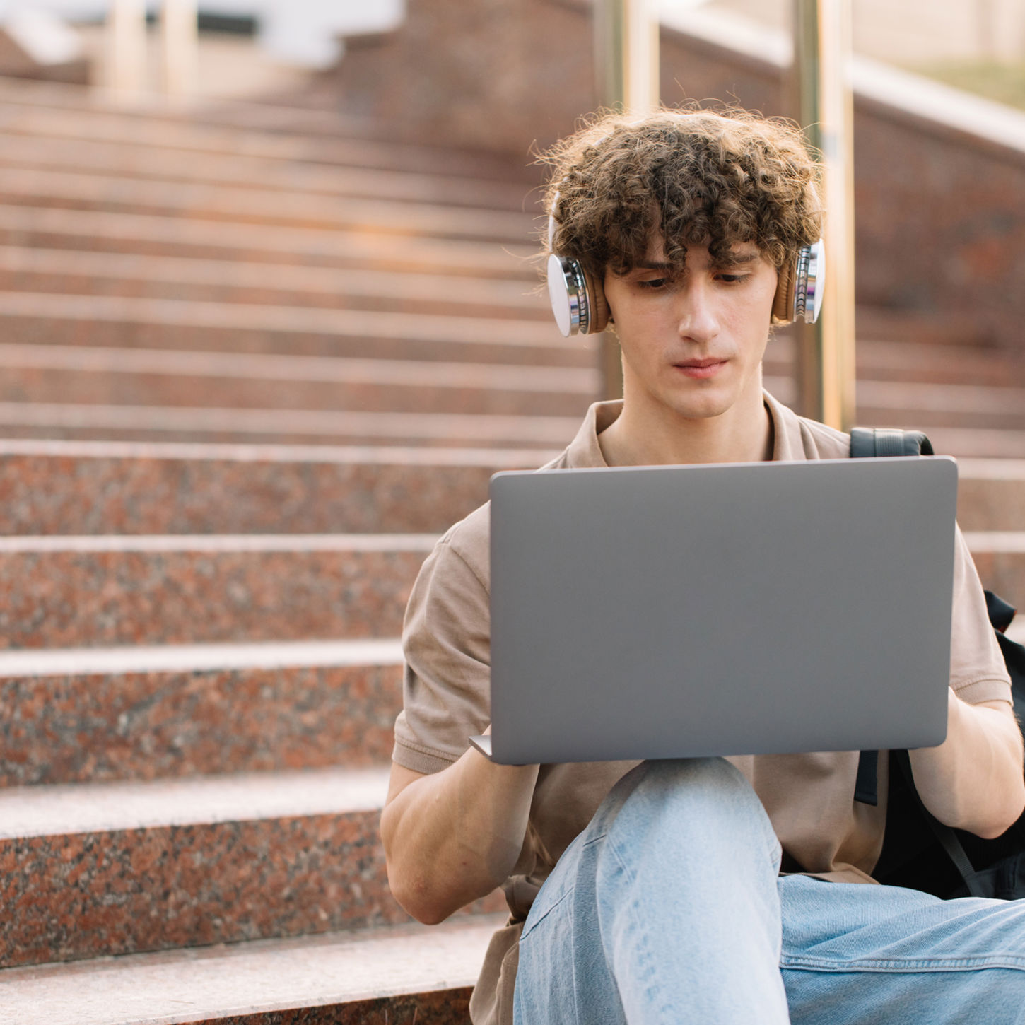 Concept Elearning Distance Study Remote Learning Concept Young Happy Curly Hair School Guy College University Student With Backpack Headphones Using Laptop Sitting Steps University